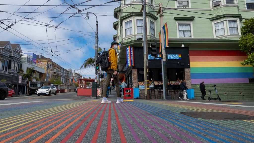 Man Crossing Rainbow Crosswalk at Castro - San Francisco Itinerary