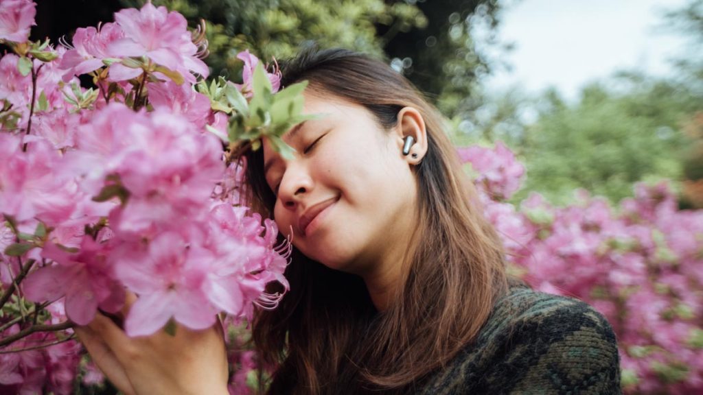 Girl Smelling Flowers Maze Land - Jeju Guide