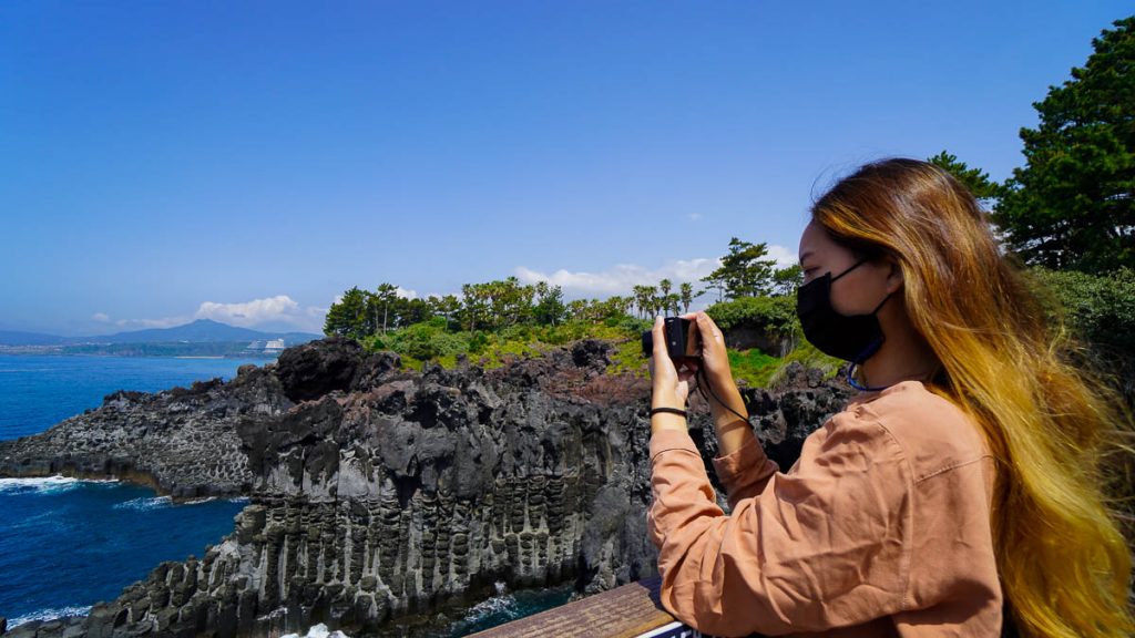 Girl at Jusangjeollidae Lava Cliff - Things to do in Korea