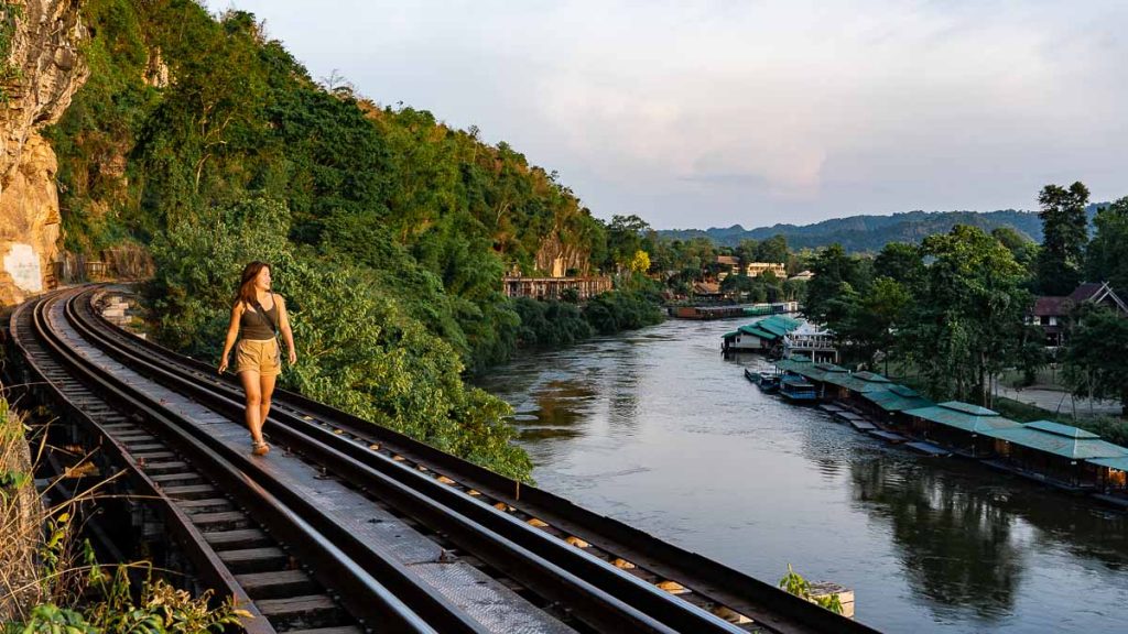 Kanchanaburi Death Railway Visitor Walking Along Tham Kra Sae Bridge - Thailand Road Trip