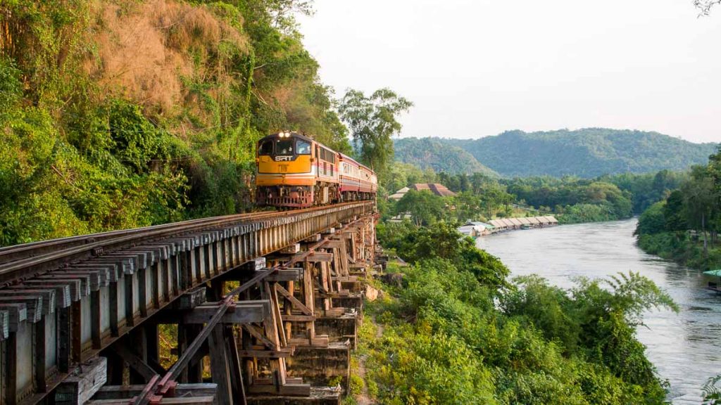 Train on the Tham Kra Sae Bridge Kanchanaburi Death Railway - Thailand Road Trip