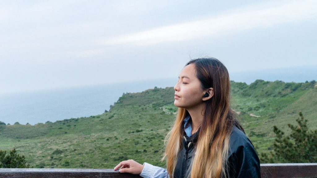 Girl at Seongsan Ilchulbong Peak - K-pop and K-drama Filming Locations