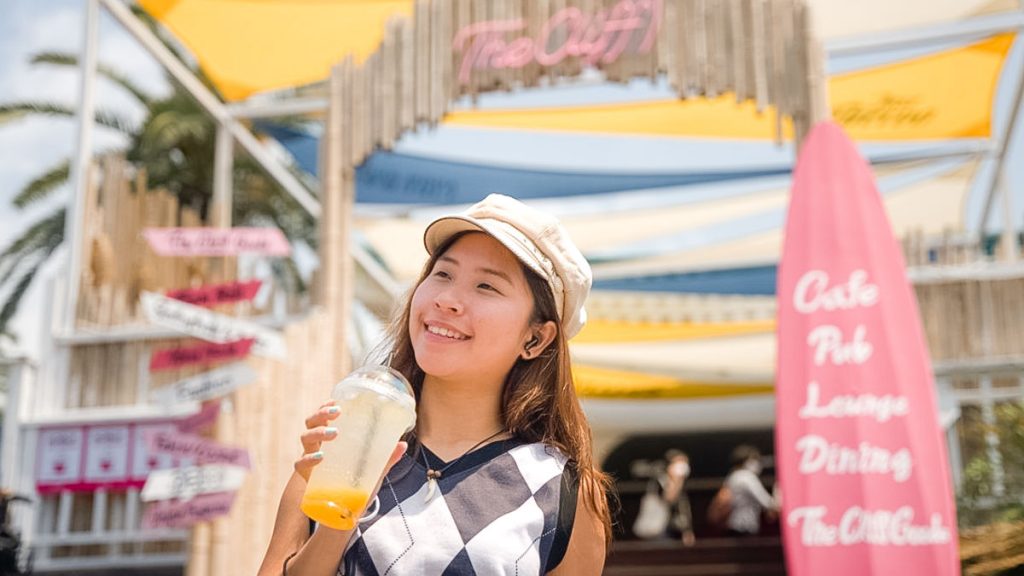 Girl Drinking Juice The Cliff Cafe - Jeju Guide