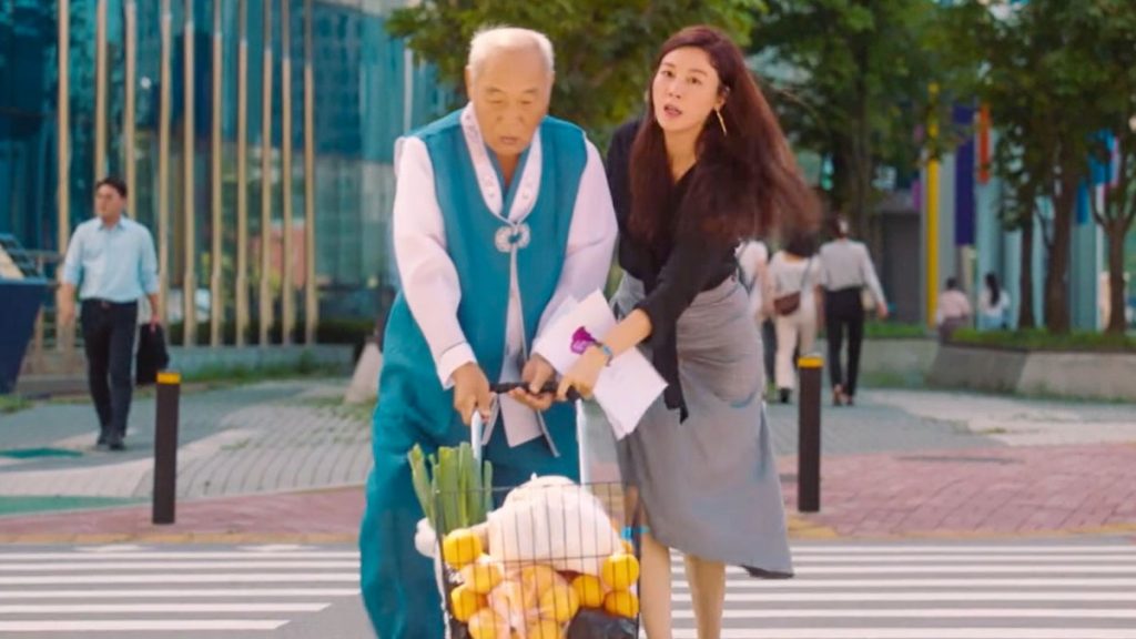 Girl helping old man cross road - Korea