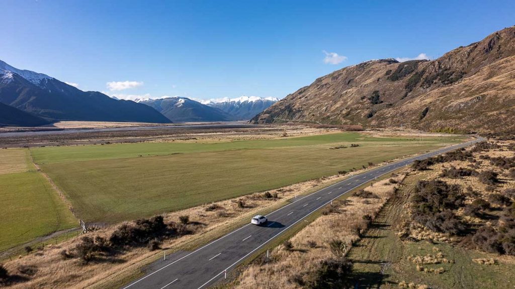 Arthur's Pass Drive Drone Shot of Car - New Zealand South Island Guide