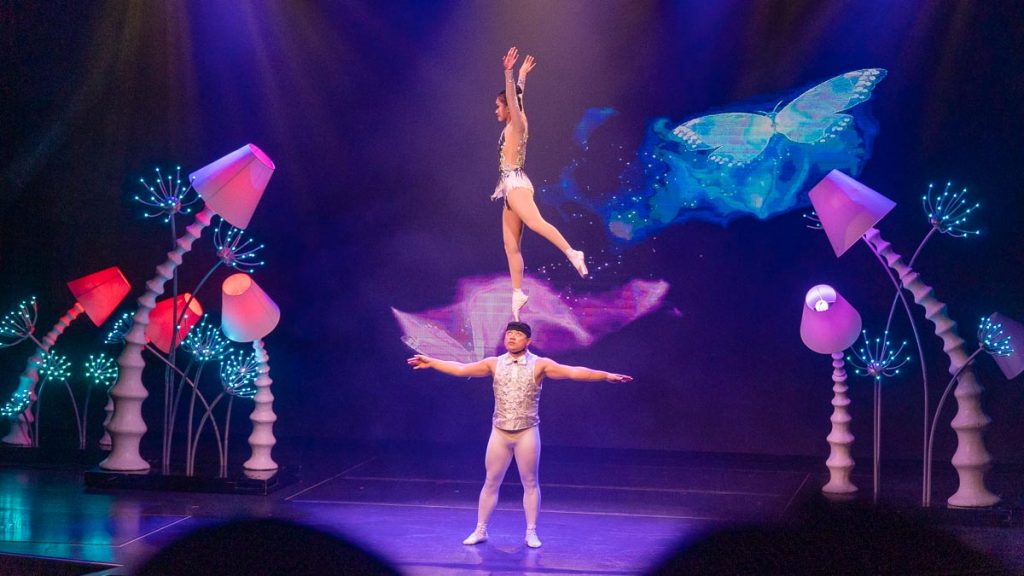 Couple Doing Balancing Act - Travelling with Kids