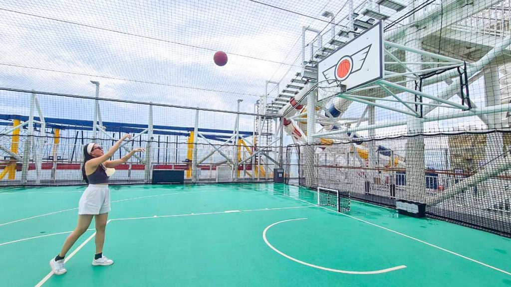 Girl Playing Basketball at SportsPlex - Singapore Cruise