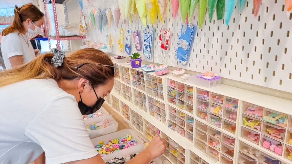 Person Picking Charms - Things to do Johor Bahru