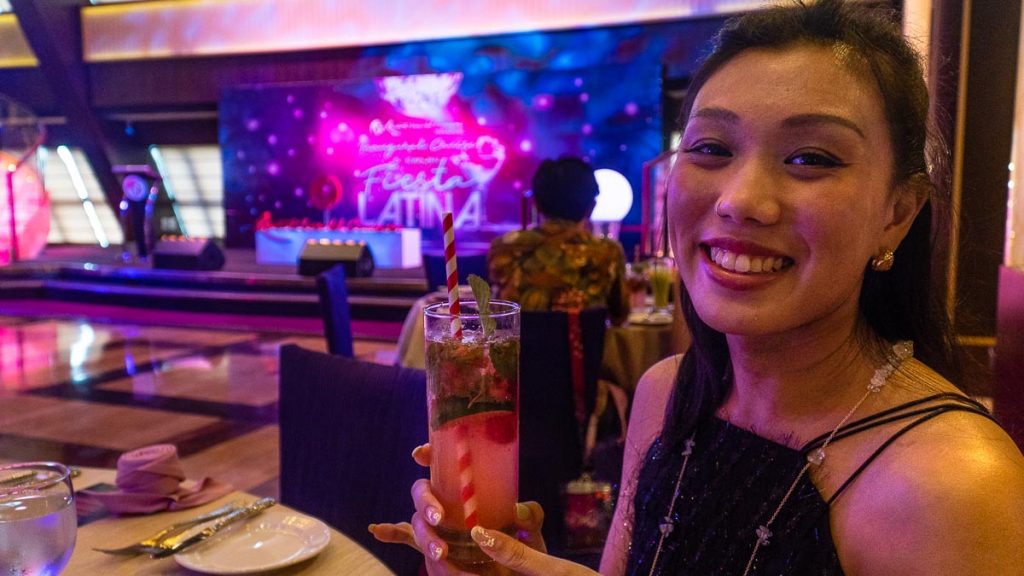 Girl Holding Cocktail - Genting Dream