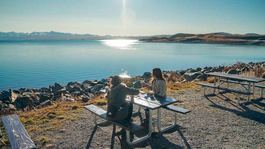 Lake Pukaki Visitors Enjoying Mount Cook Alpine Salmon - New Zealand South Island Guide