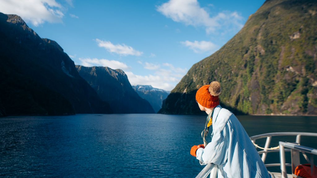 Milford Sound Cruise Real Journeys Guest Looking Out - Best Things to do in Milford Sound