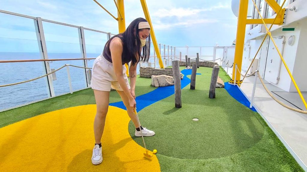 Girl Playing Mini-golf - Genting Dream