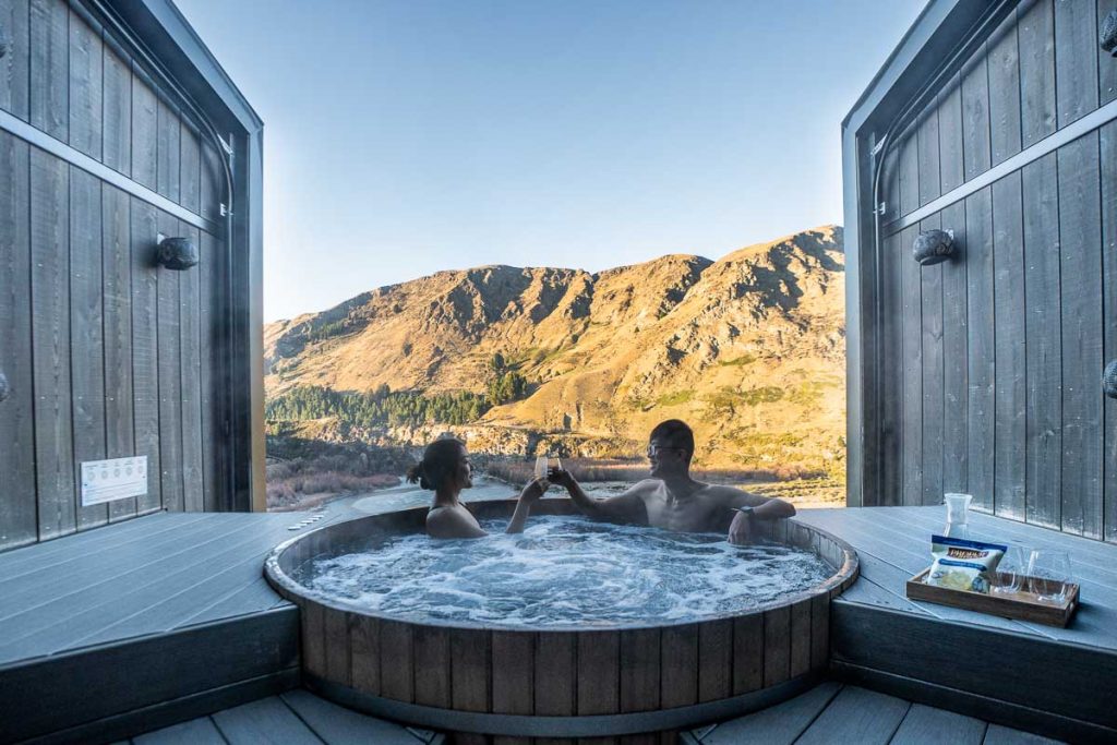 Friends Soaking in Onsen Hot Pools - New Zealand Queenstown