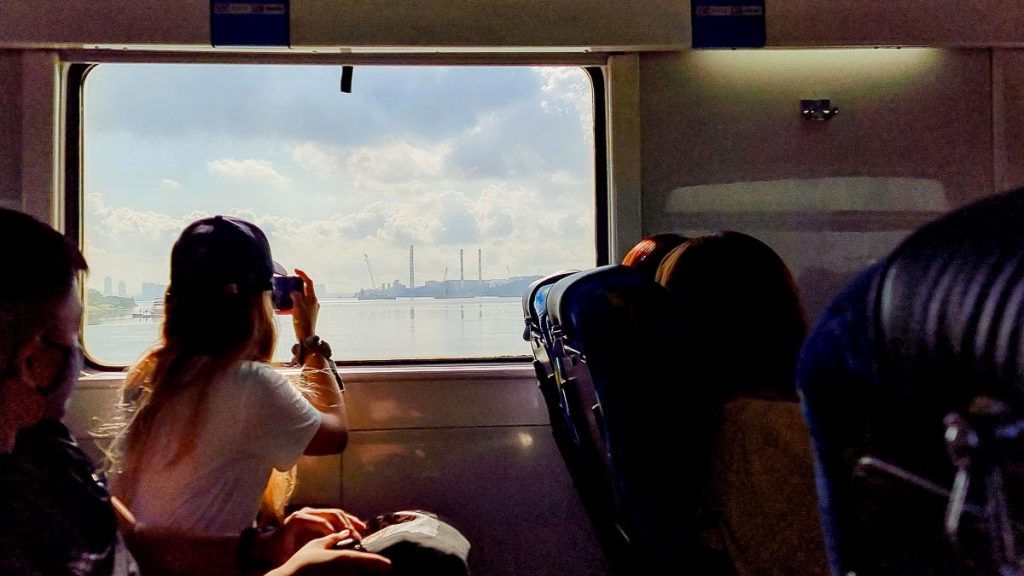 Riders on KTM train from Singapore to Johor - Visiting Johor from Singapore