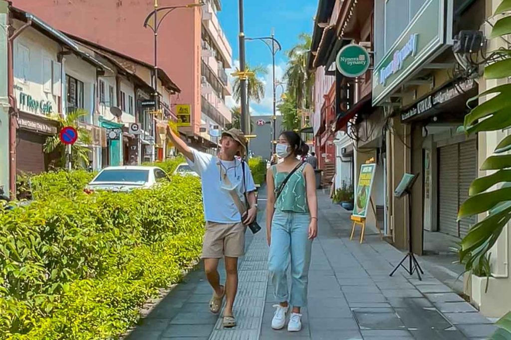 Tourists walking down streets of JB - Visiting Johor from Singapore