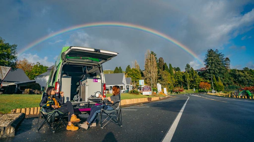 Campervan Outdoor Dining with Rainbow Background New Zealand Road Trip