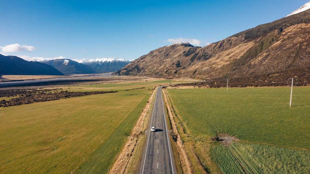 Drone Shot of Car at Arthur's Pass - New Zealand Road Trip