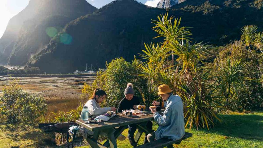 South Island Milford Sound Eating Outdoors - New Zealand Road Trip