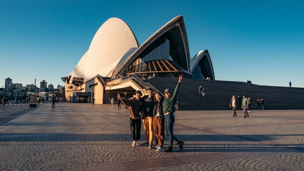Sydney Opera House Tourists taking Group Photo - Best Things to do in Sydney