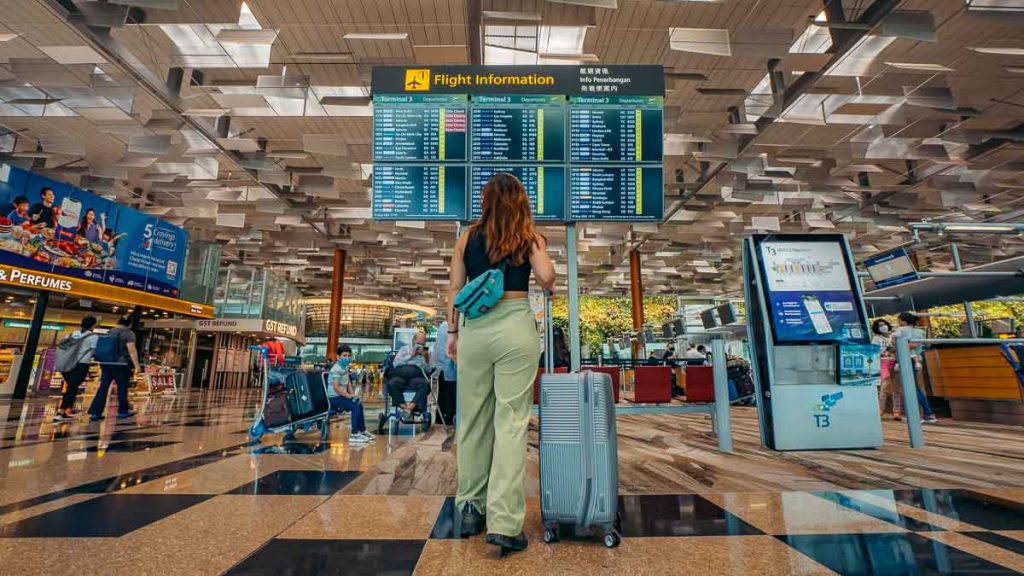 Traveller at Singapore Changi Airport - Travelling using NordVPN