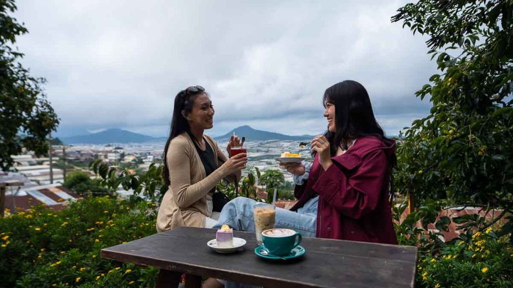 Girls enjoying tea break at Cafe Tui Mo To  - Da Lat Itinerary