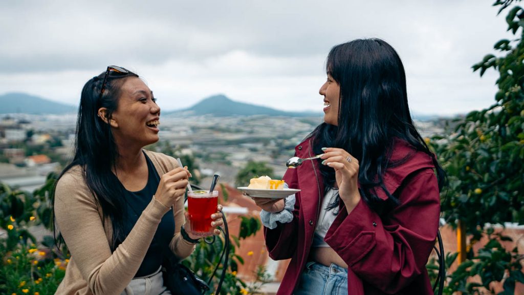 Da Lat Tui Mo To Cafe Diners Enjoying Food with a View - What to eat in Southern Vietnam