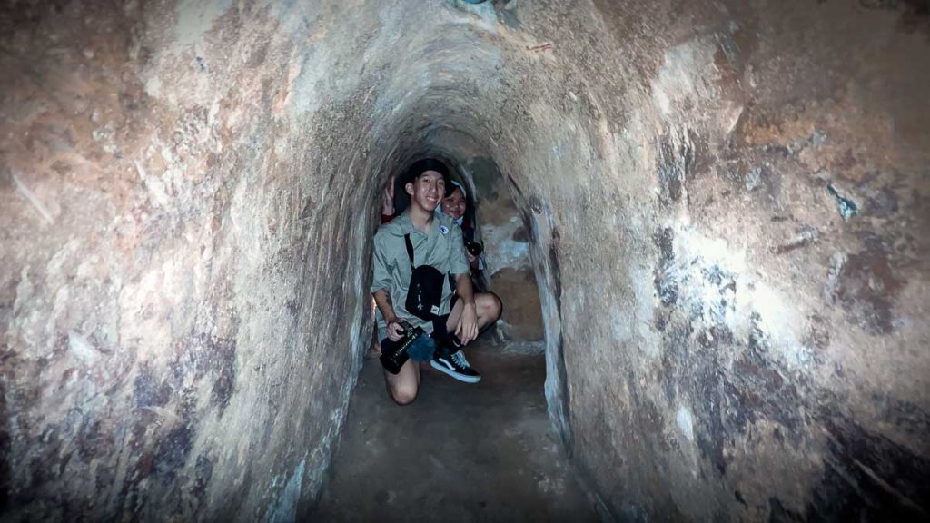 Two friends in the Cu Chi Tunnels - Things to do in Ho Chi Minh City