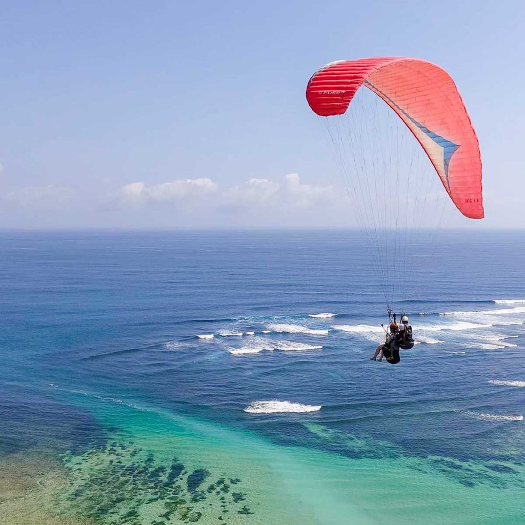 Paragliding over Ocean bali - Bali Guide