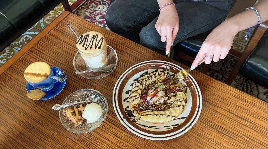 Waffles and traditional Vietnamese egg coffee at cafe Coi Kissa - Things to do in Da Lat