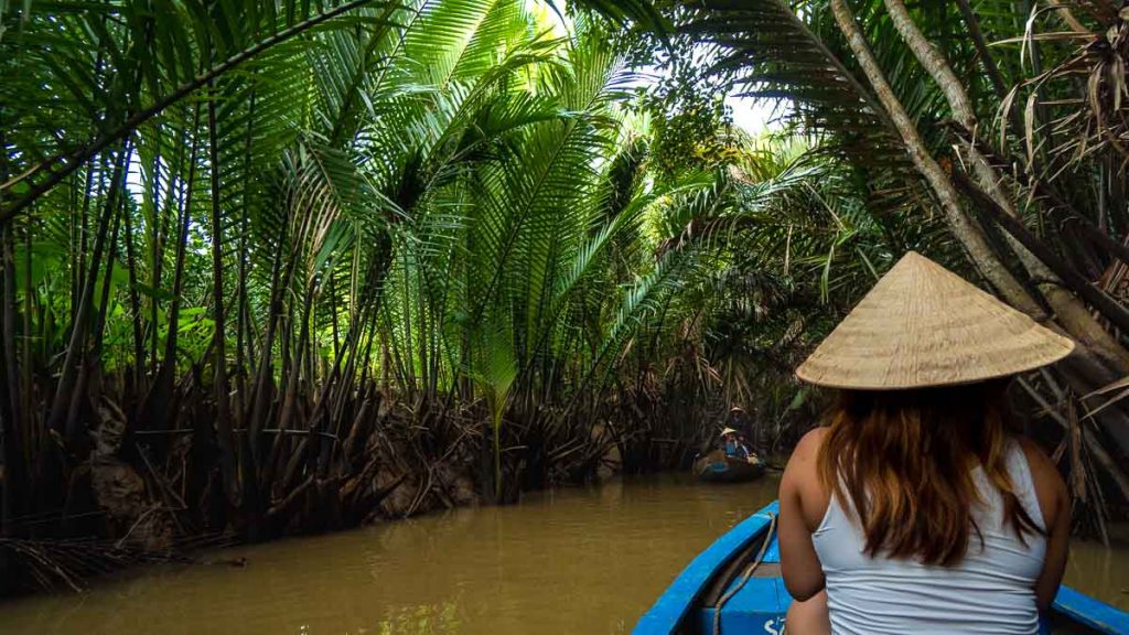 Row boat in the Mekong Delta - Mekong River