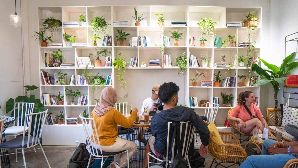 People enjoying a drink in Saigon Oi in The Cafe Apartments - Things to do in Ho Chi Minh City