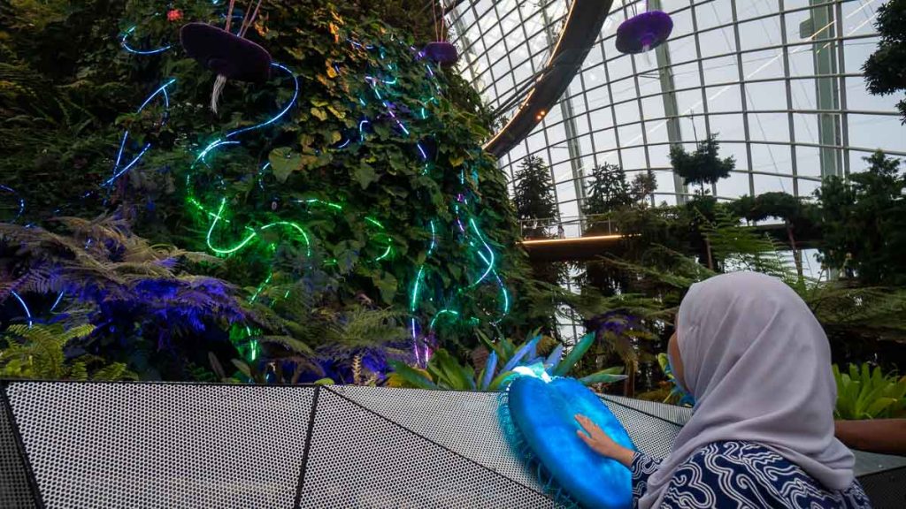 Girl Interacting with Hometree Avatar Cloud Mountain - Things to do in Gardens by The Bay