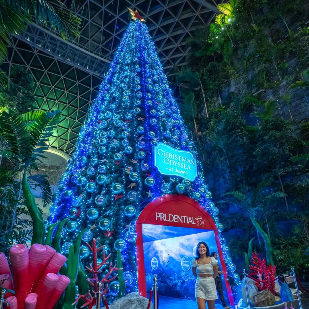 Girl at Christmas Odyssea Tree - Changi Festive Village