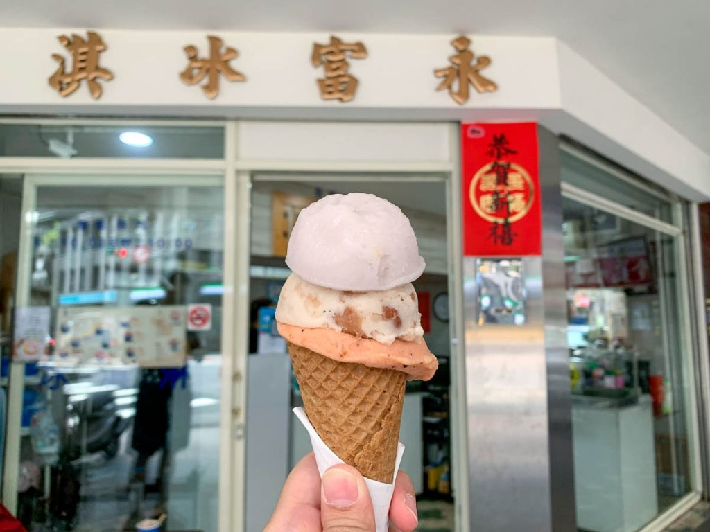 Taro, red bean and limei (sour plum) scoops of ice cream on a cone from Yongfu Ice Cream - muslim-friendly taipei
