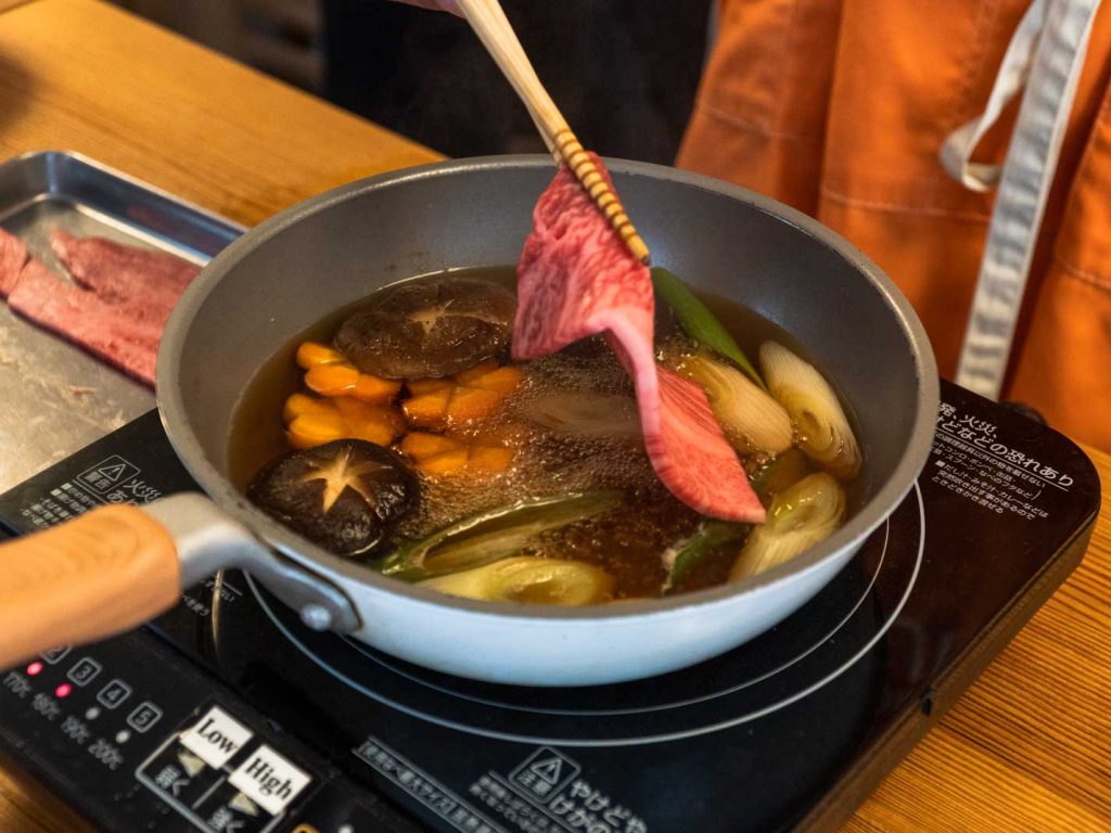 Cooking Wagyu in Sukiyaki Broth in Kaiseki Cooking Class - Japan Itinerary