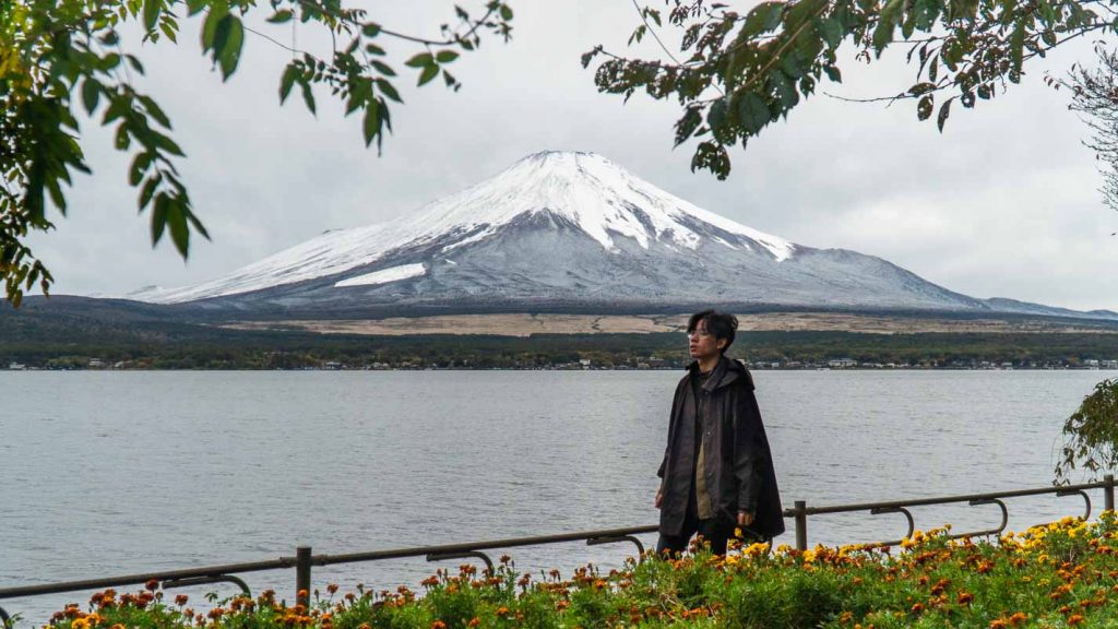 Man walking by Lake Yamanaka 