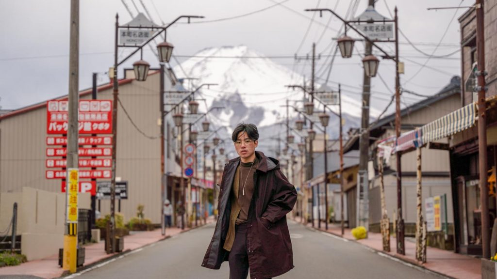 Man posing on the road - Japan self-driving guide