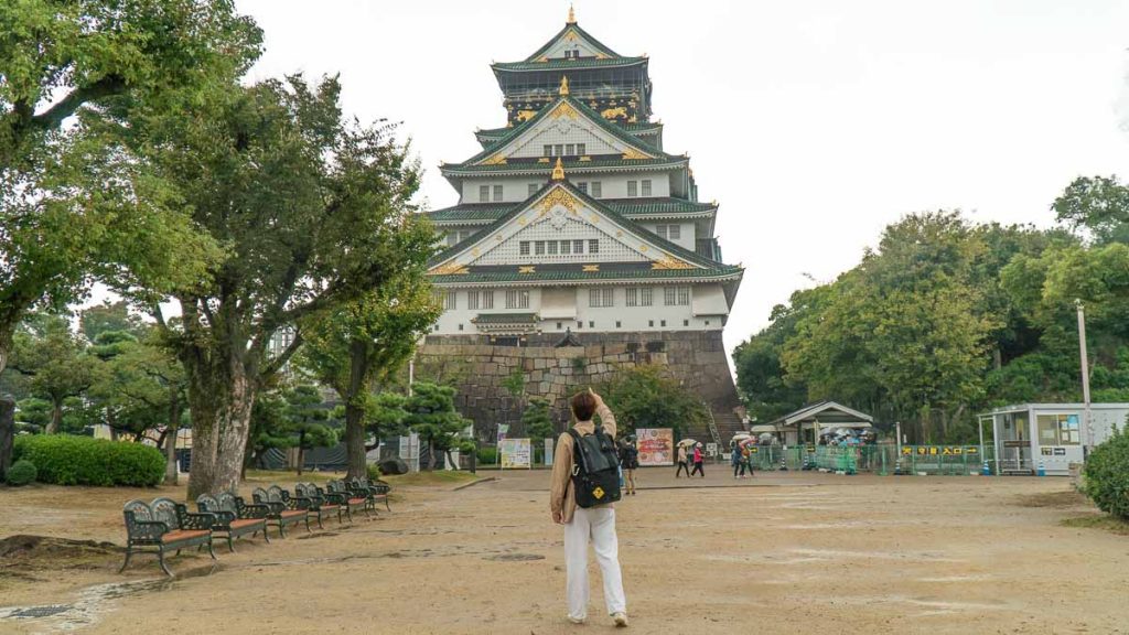 Boy at Osaka Castle - Japan theme parks