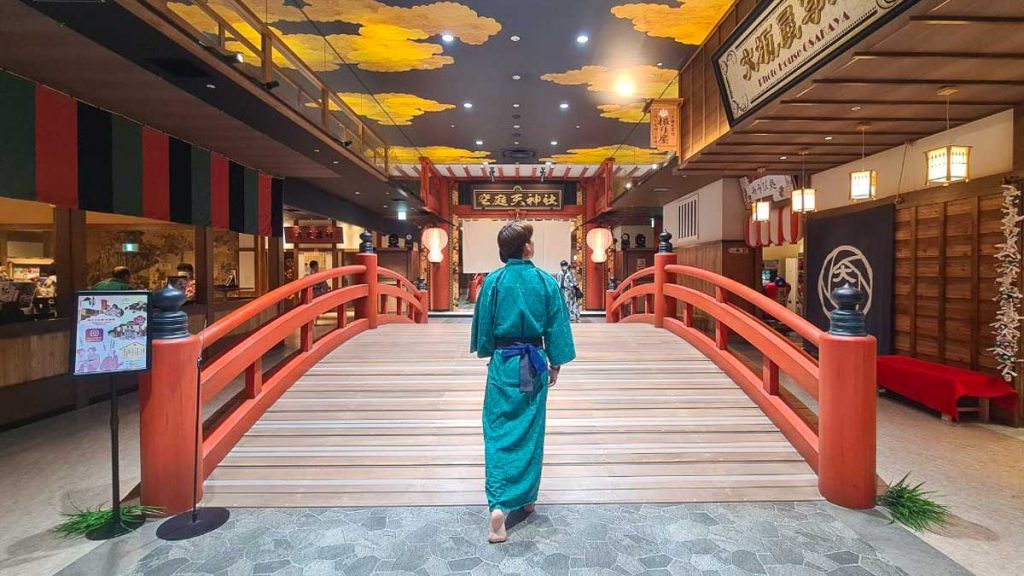 Man on Solaniwa Onsen Bridge - Japan Itinerary