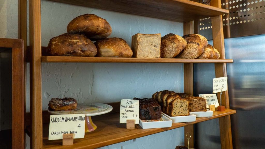 bread and cakes on display in woodlands sourdough - thomson-east coast line
