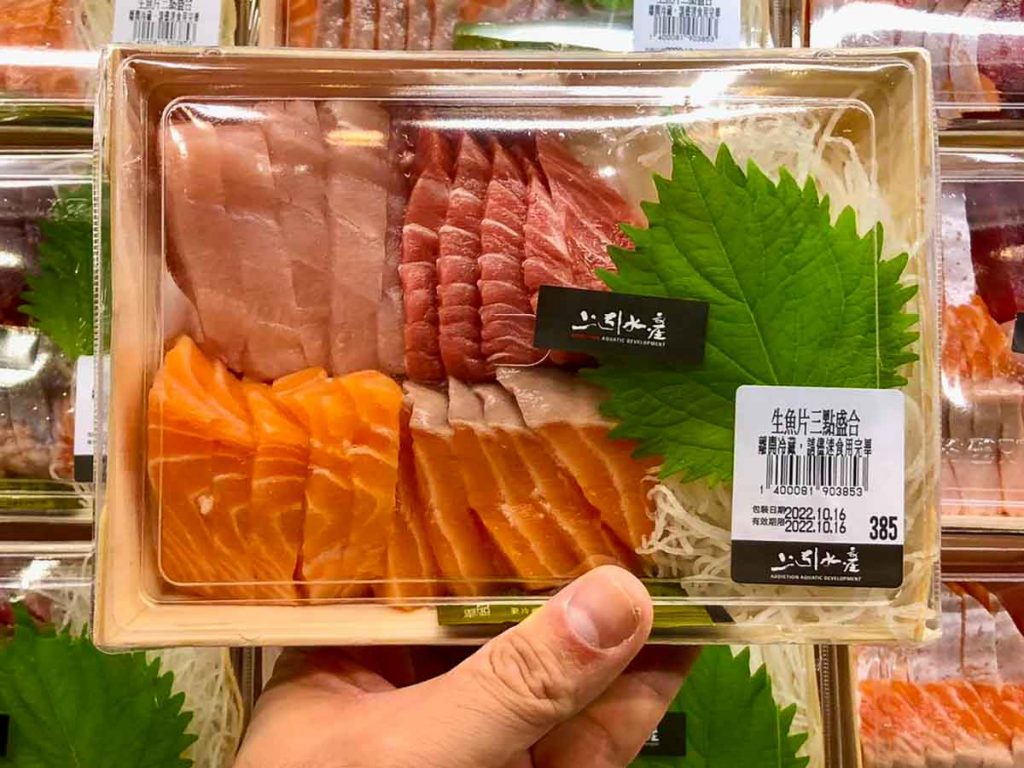 a tray of sashimi and tuna from addiction aquatic development - food in taipei