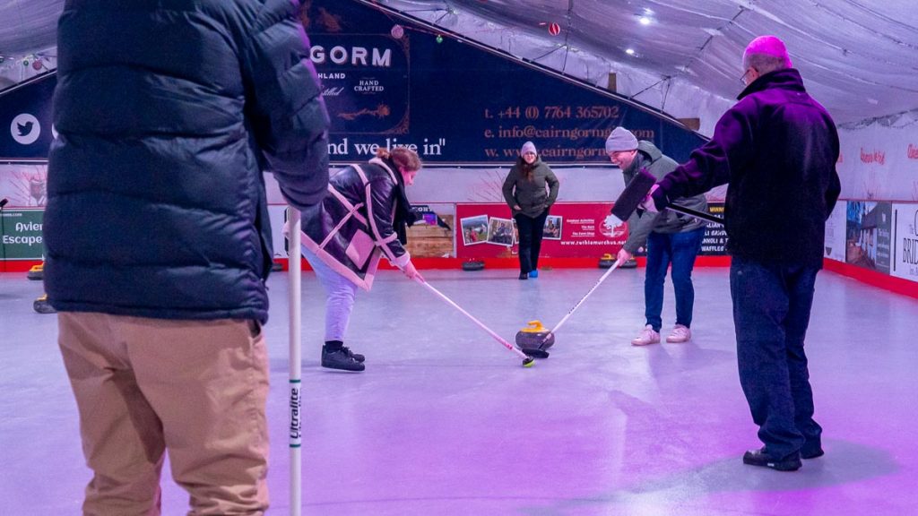 Curling in teams Aviemore Ice Rink - Things to do in Scotland