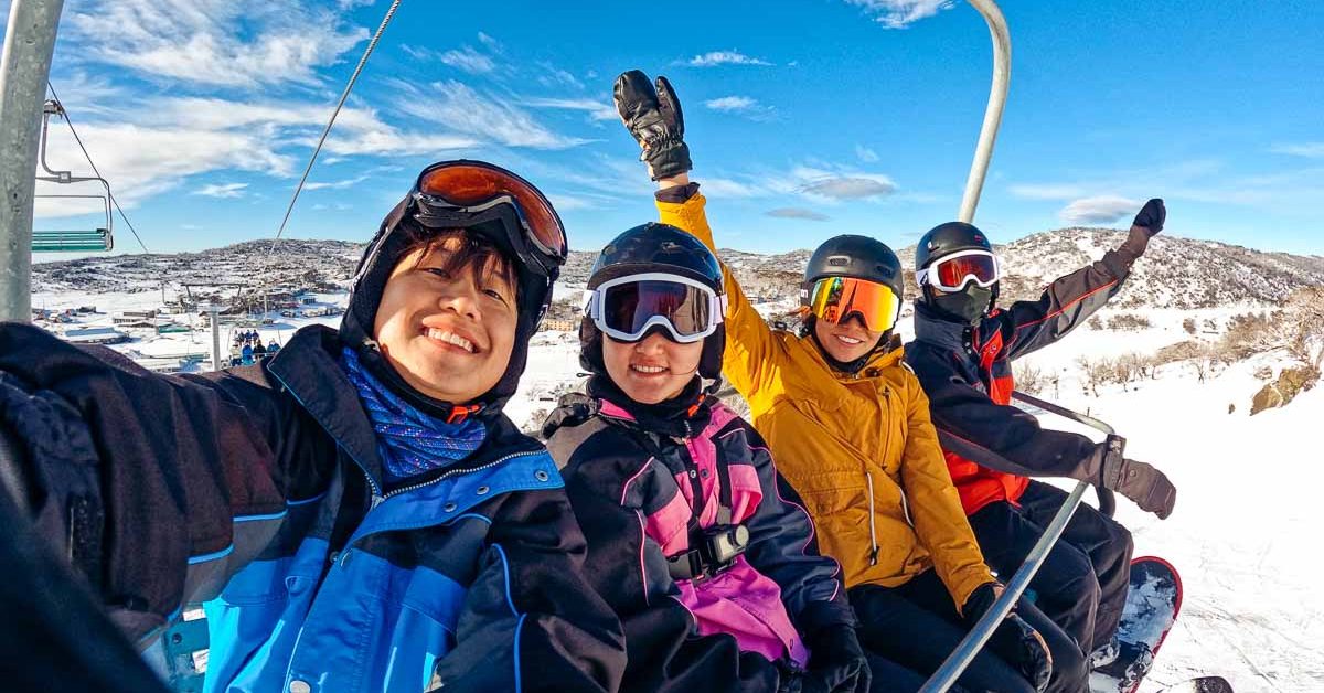 Snowboarders on Ski Lift at Perisher Resort - Things to do in Sydney