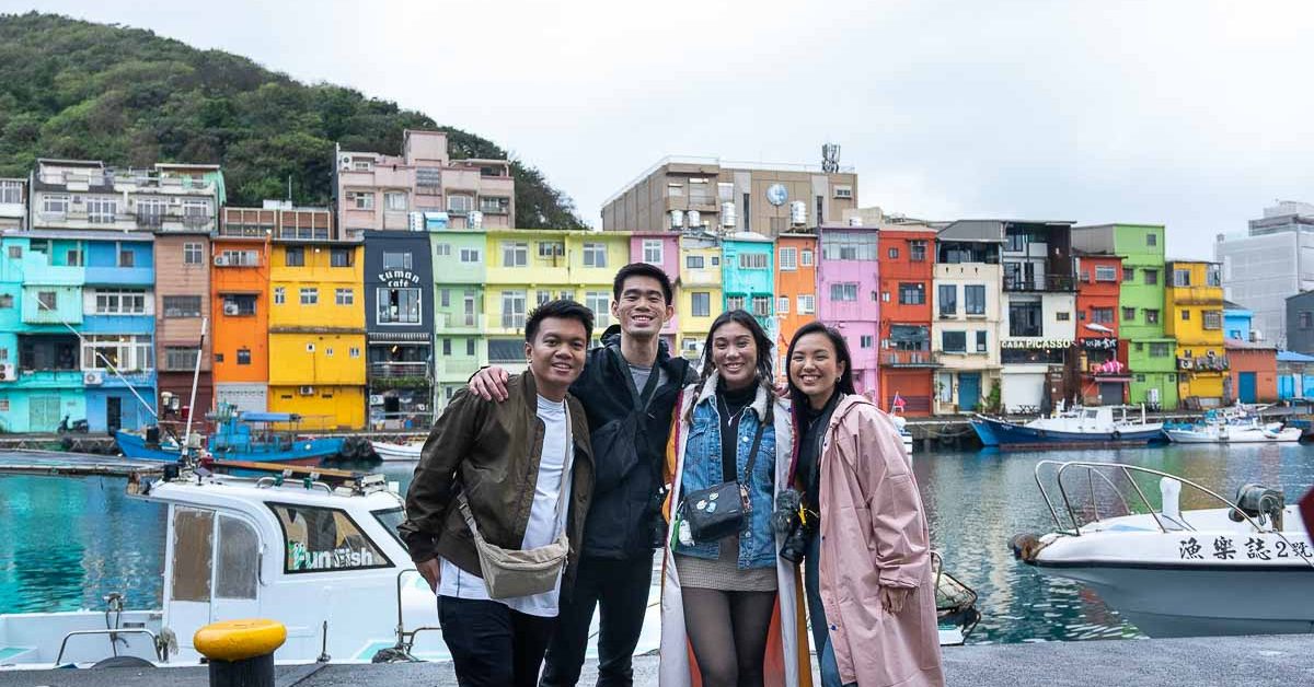 group Photo at Zhengbin Port Colour Houses - Taipei Itinerary