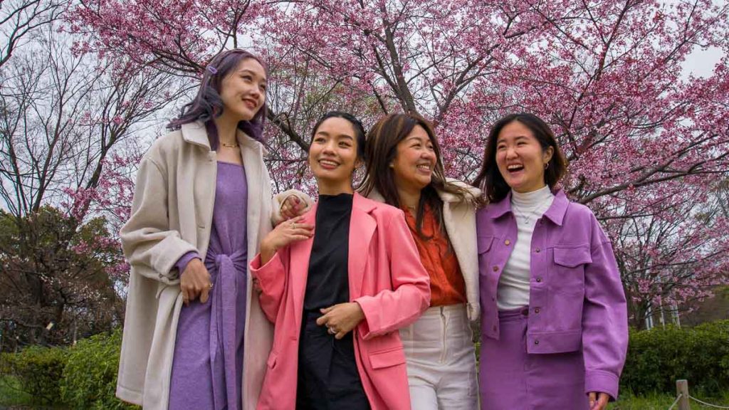 Group of girls wearing love bonito and laughing in Japan - Travel outfit ideas