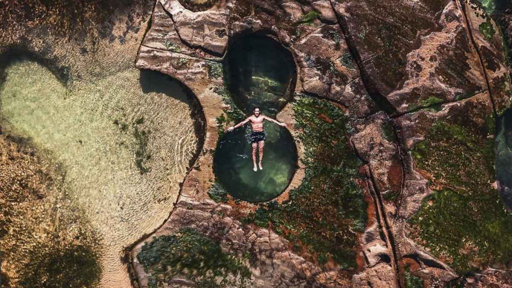 Man in Figure 8 Pools - Australia Road Trip