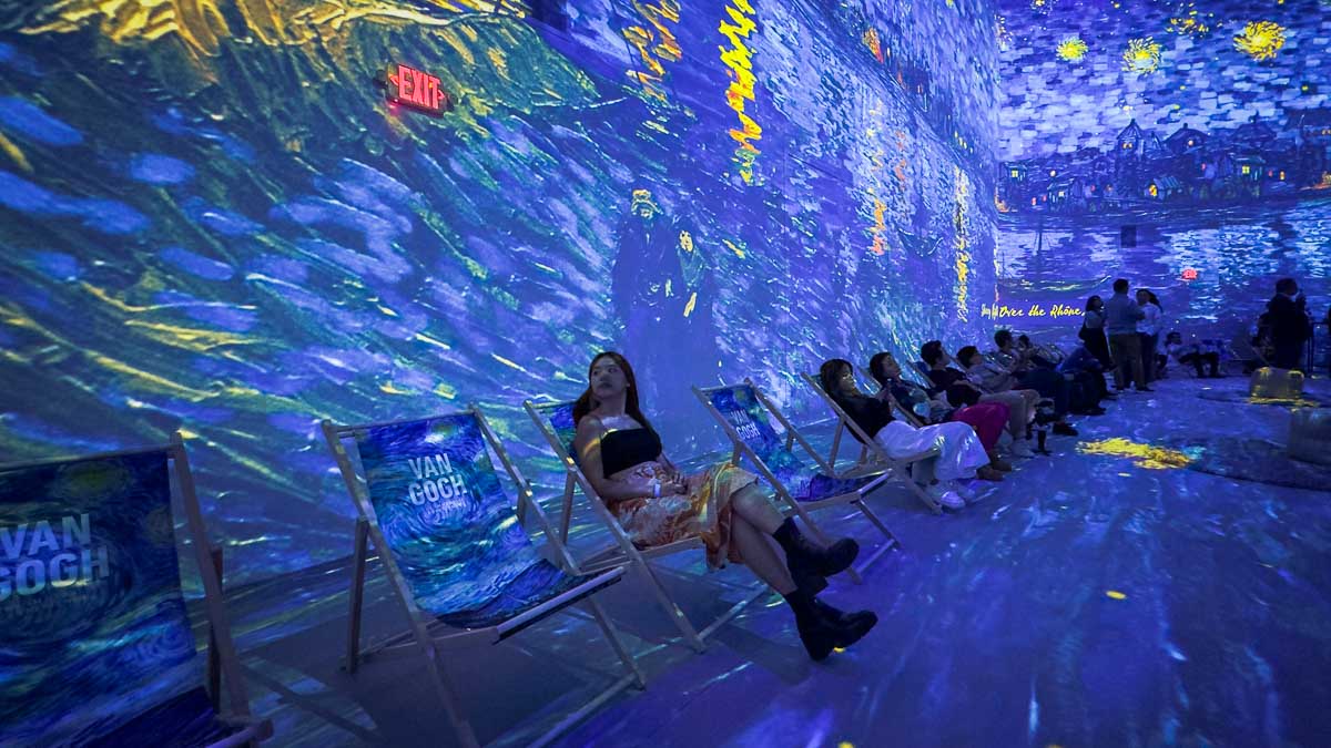 Girl looking at Van Gogh Immersive Room- Things to do in Singapore Feb 2023