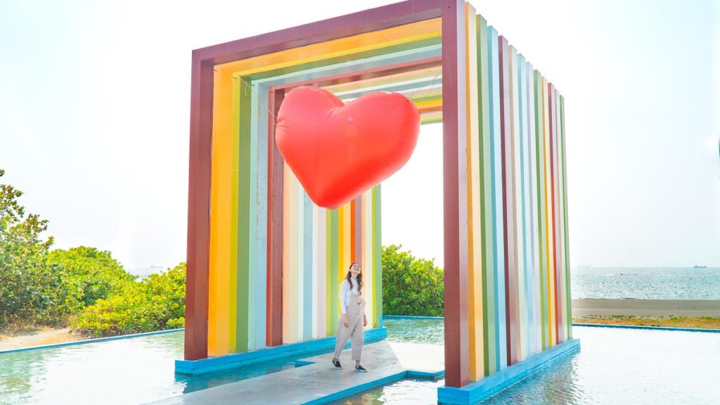 Girl at Rainbow Church Heart Building - Things to do in taiwan