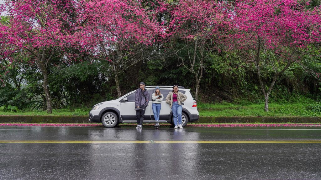 Friends in front of rented car in Yilan - Taiwan Itinerary