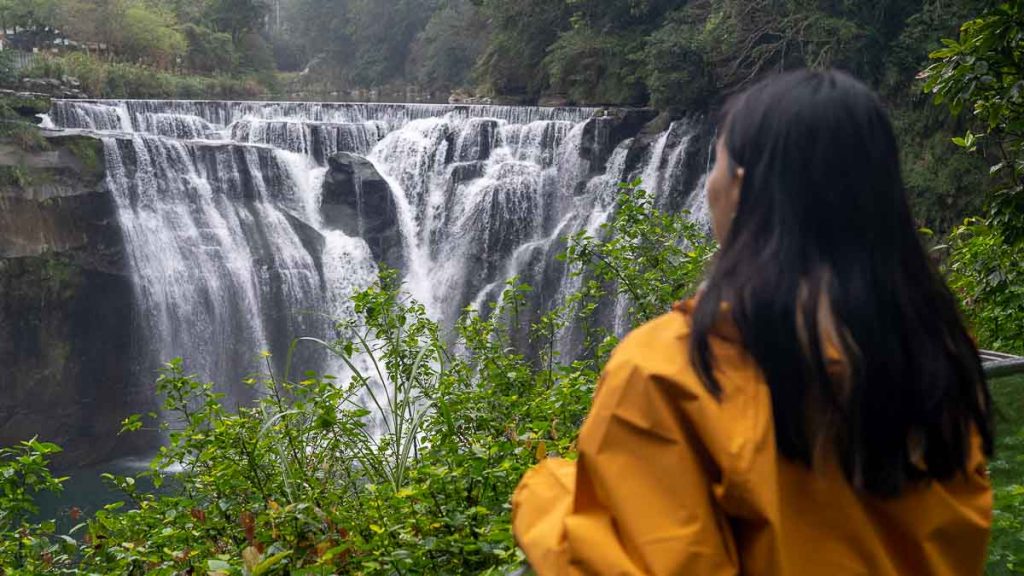 Woman looking at Shifen Waterfall - Things to do in Taiwan